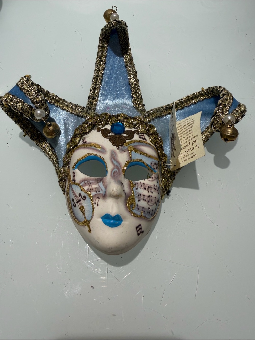 La mashers del galeone Blue Jester Wall Mask with Musical Design -